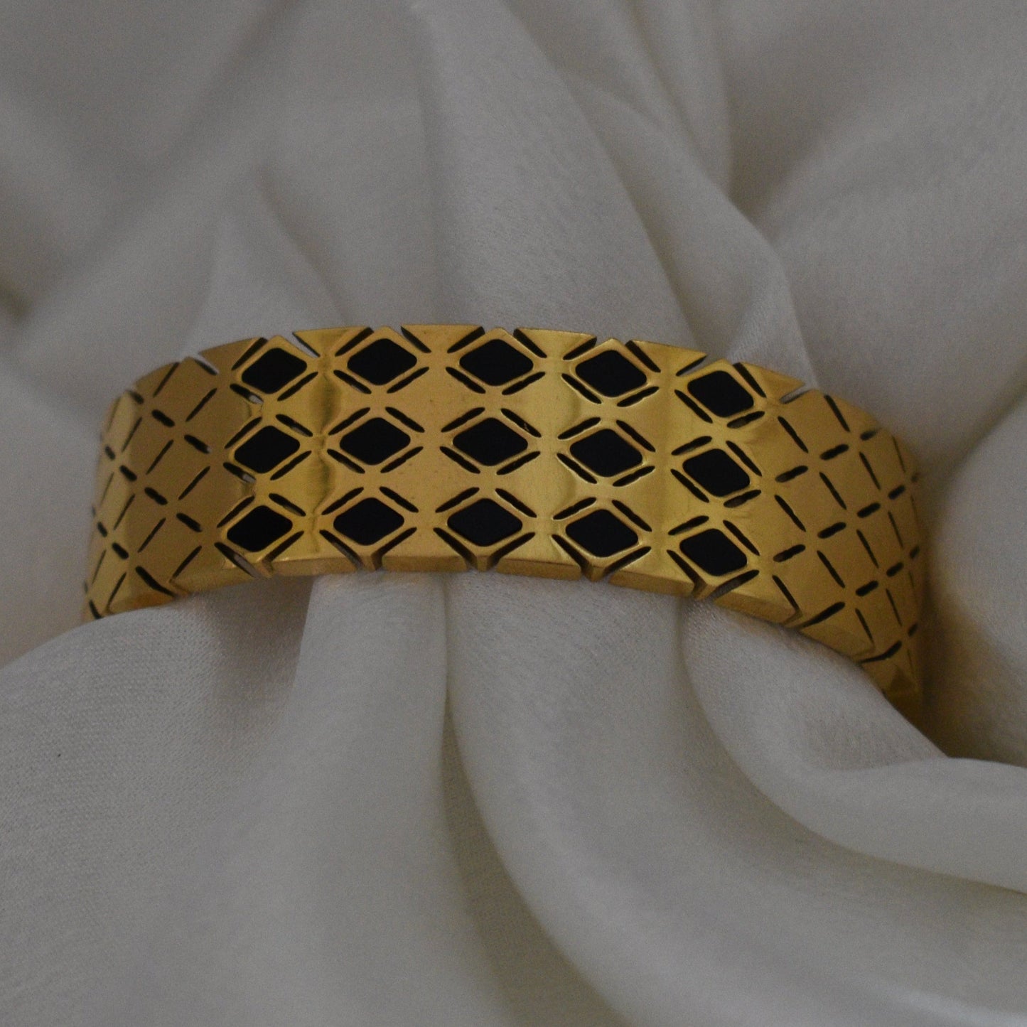 Cuff Bracelet in Gold with Detailed Geometric Cutout Design
