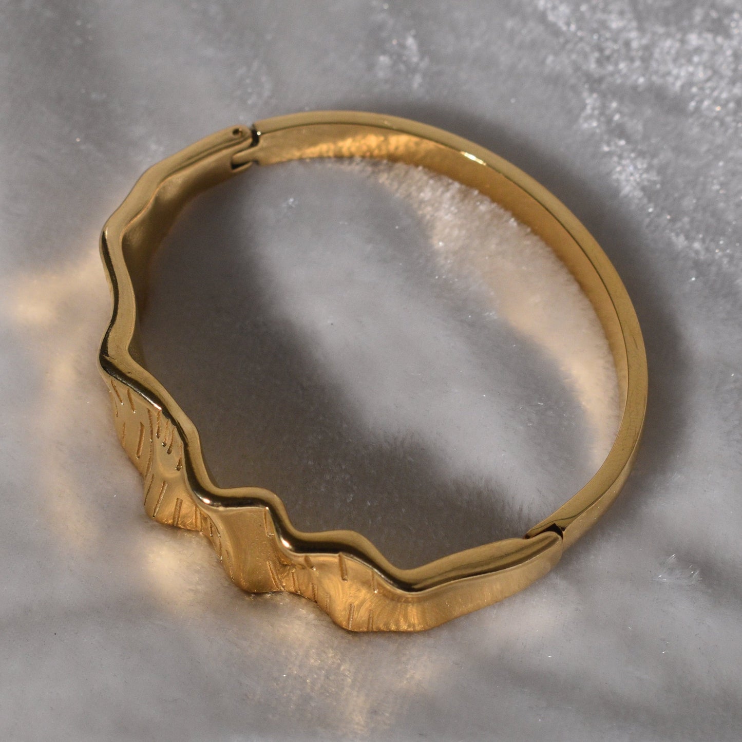 Gold-Plated Bracelet with Texture and a Distinct Wavy Pattern