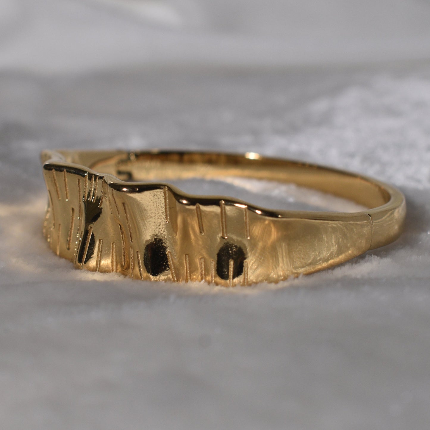 Gold-Plated Bracelet with Texture and a Distinct Wavy Pattern