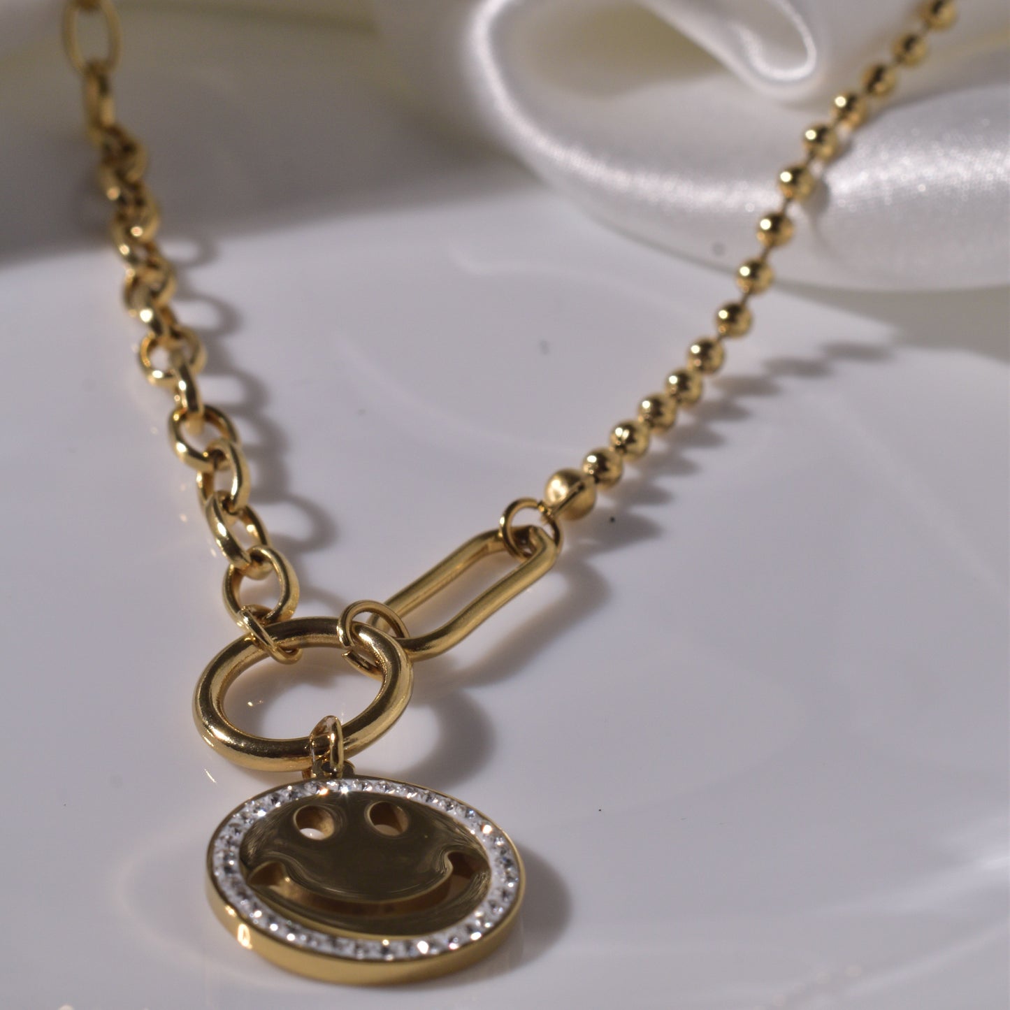 Spread Happiness in Style with a Smiley Charm Necklace