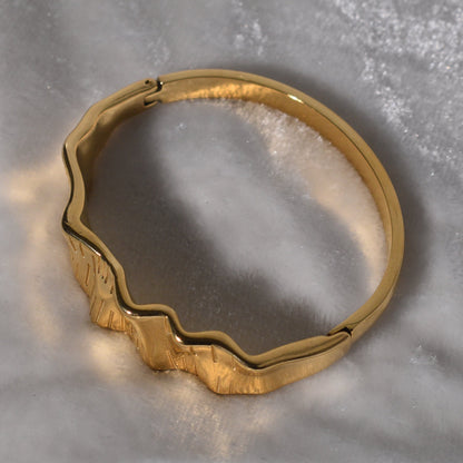 Gold-Plated Bracelet with Texture and a Distinct Wavy Pattern
