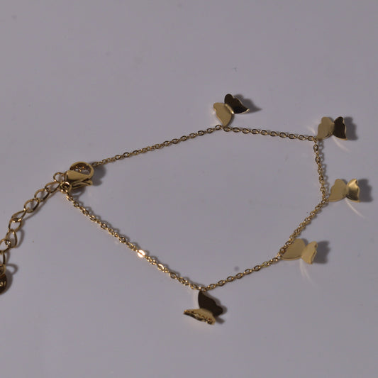 Butterfly Charm Bracelet with Fluttering Elegance